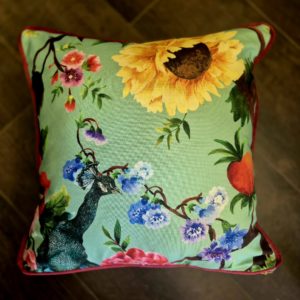 Sunflower and peacock cushion with raspberry velvet back and piping