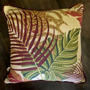 Botanical fabric cushion with burgundy velvet back and piping
