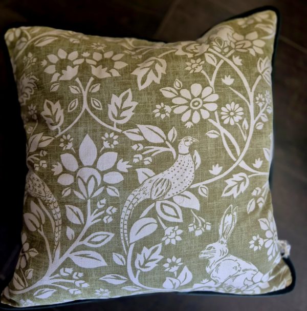 Sage green Pheasant and Hare cushion with bottle green back and piping