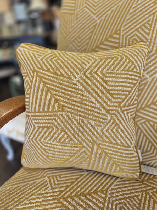Linwood Sashay Mustard cushions with plain mustard velvet piping