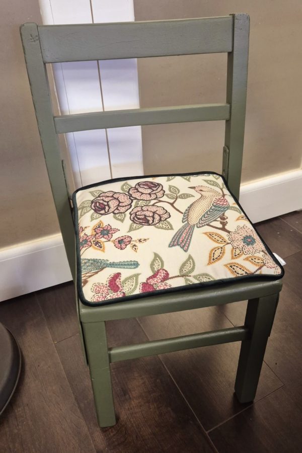 Child's chair and bird cushions