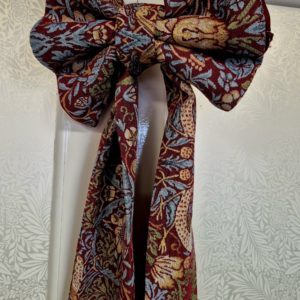 statement fabric door bow red strawberry thief tapestry